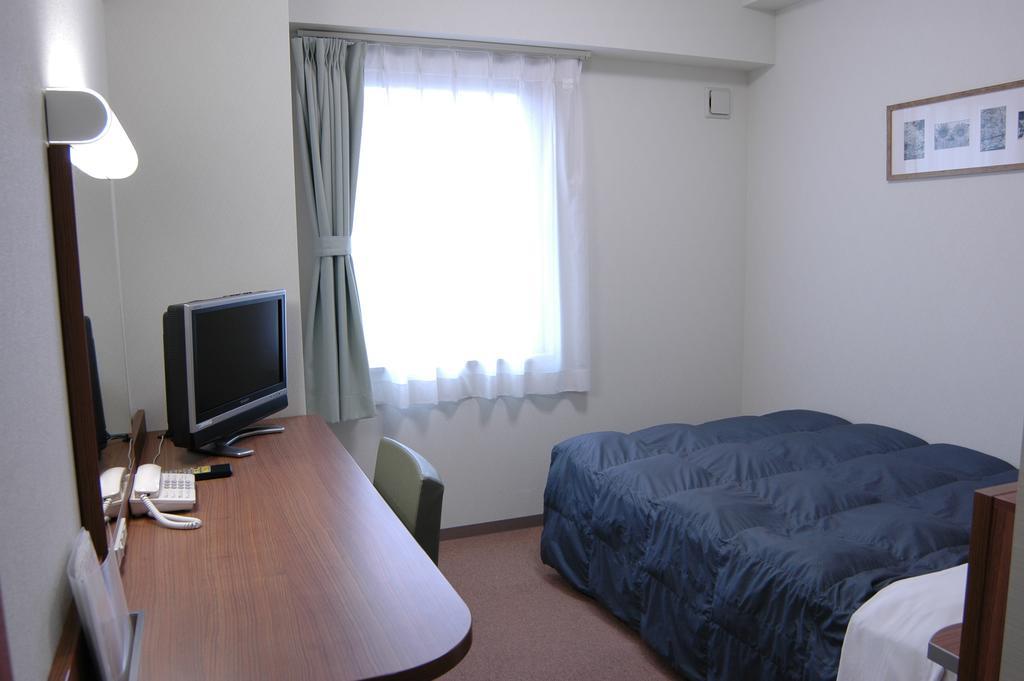 Hotel Econo Tsu Station Экстерьер фото