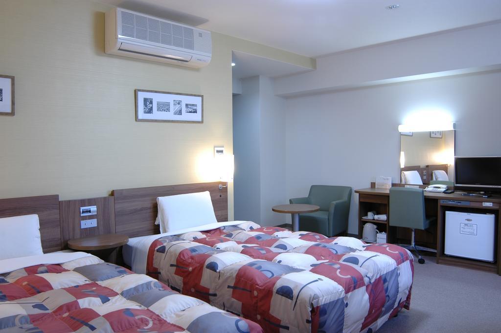 Hotel Econo Tsu Station Экстерьер фото