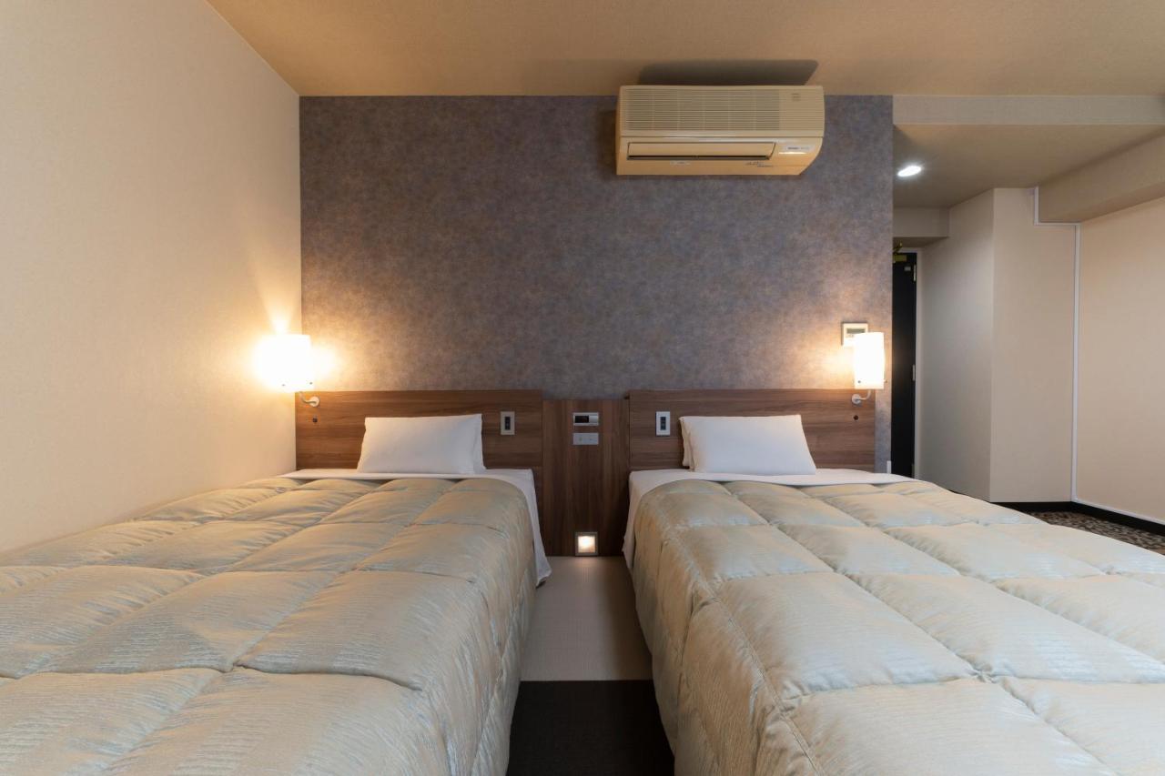 Hotel Econo Tsu Station Экстерьер фото